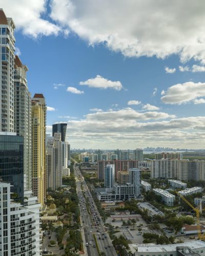 view-from-above-of-luxurious-highrise-hotels-and-c-2025-06-23-22-34-47-utc-min